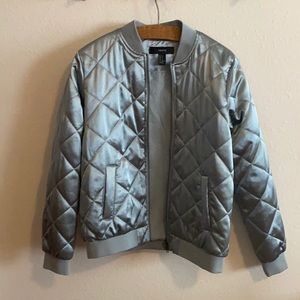 NWOT sky blue quilted bomber jacket.